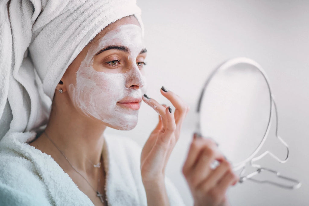 woman-applying-beauty-mask