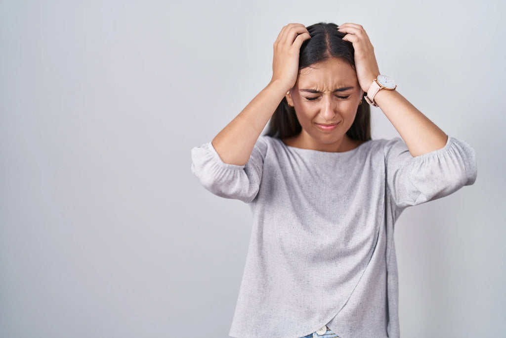 young-hispanic-woman-standing-white-background-suffering-from-headache-desperate-stressed-because-pain-migraine-hands-head