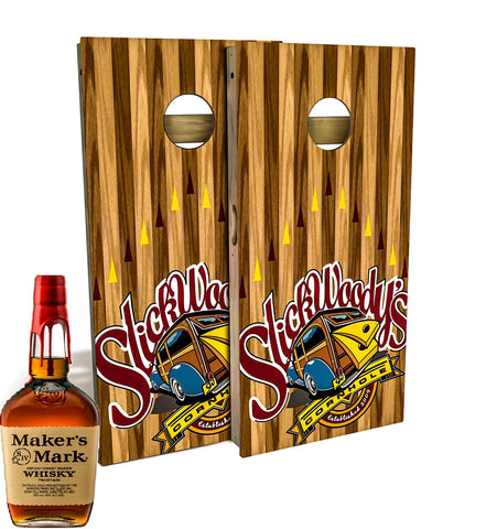 Bottle of Maker’s Mark Whisky next to the Slick Woody’s Signature Cornhole Board Set