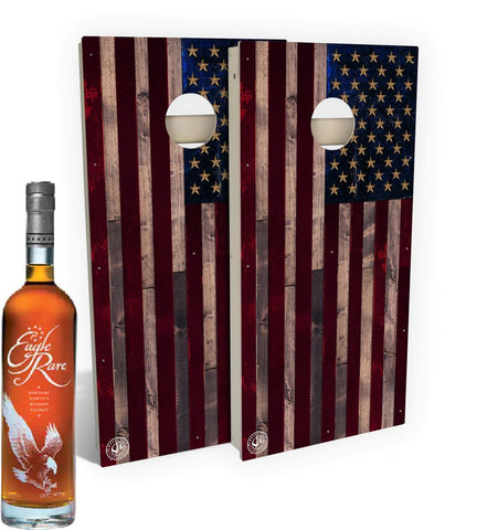Bottle of Eagle Rare Single Barrel Bourbon Whiskey next to the Rustic Wood American Flag Cornhole Set