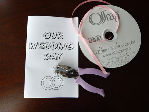 children's our wedding day coloring  and activity book, spool of ribbon and hole punch - Celebrating Together