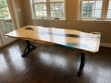 Live edge wood slab table with epoxy