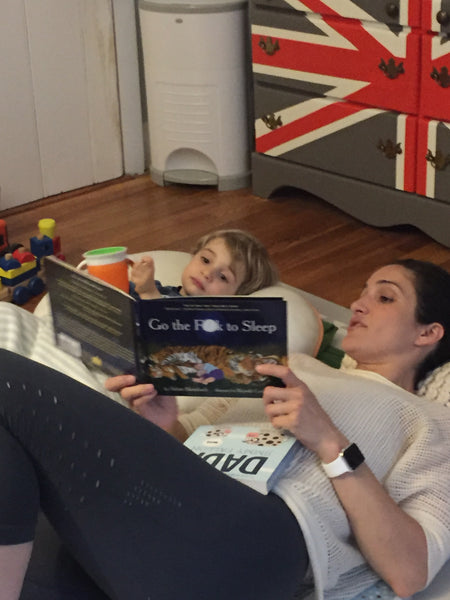 Nicole reading Emmett a bedtime story