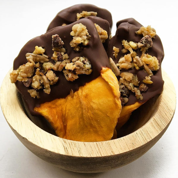 Dried mango dipped in chocolate seed butter and sprinkled with Seednola. Higher in protein, healthy fats, fiber, and micronutrients than regular chocolate. 