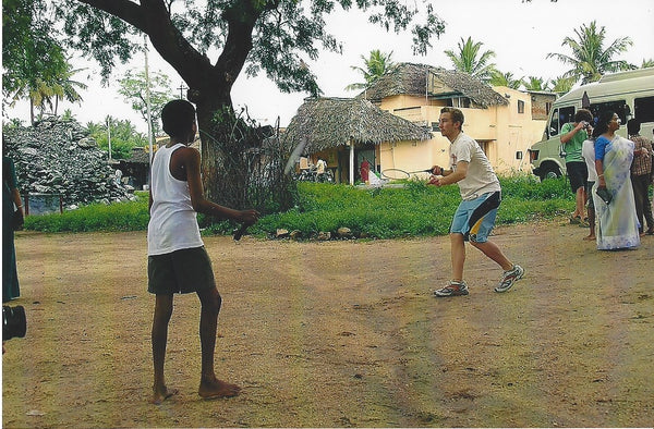 Rob playing badminton with a local in Erode, India