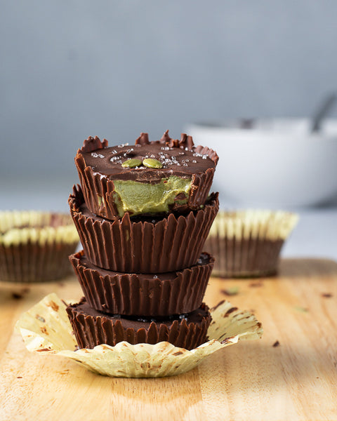 pumpkin seed butter chocolate cups stacked