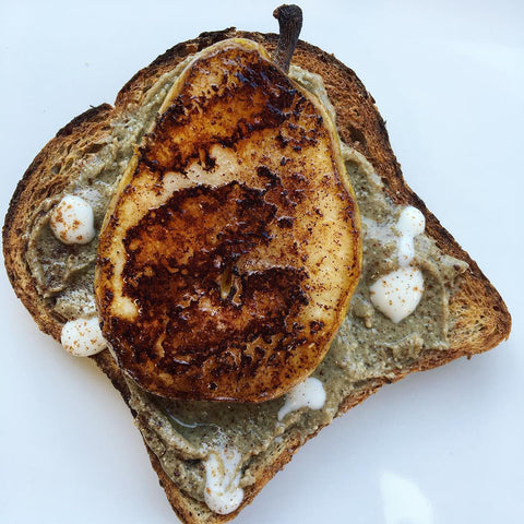 Whole grain toast topped with seed butter and spiced pear. Fun back-to-school recipe!