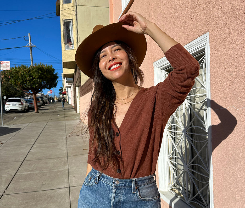 Sarah Chuck in Amour Vert's Mason Cashmere Cardigan.