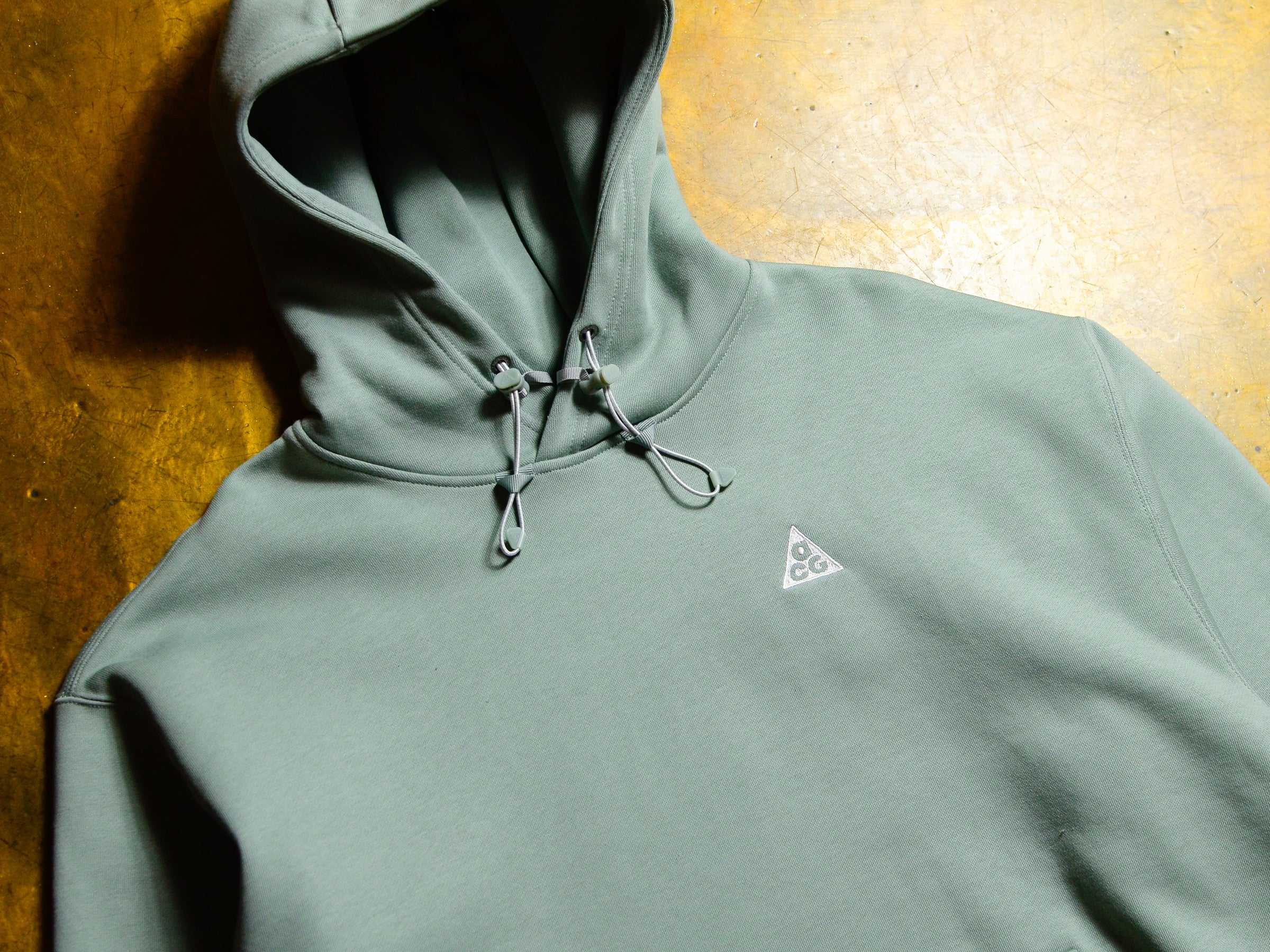 nike acg hoodie white green