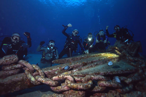 divers at Christmas Island survey anchor and chain