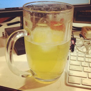 A beer and lemonade concoction sits on Marc's desk.