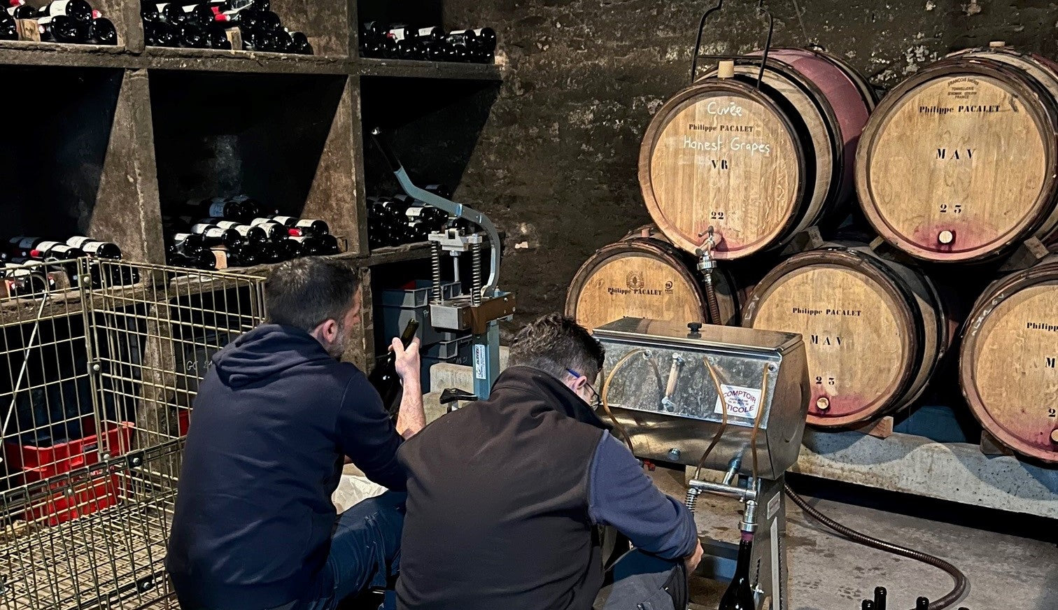 Pacalet's winemaking team bottling the Vosne 2022