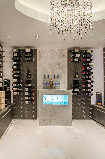 A wine cellar using Wine Peg's Nek Rite 2 bottle deep series with a custom pre-fabricated, finished and drilled wood panel.
