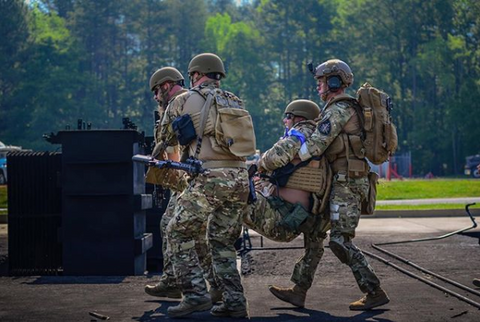 Medics evacuate a heat casualty. Photo credit: SOARescue