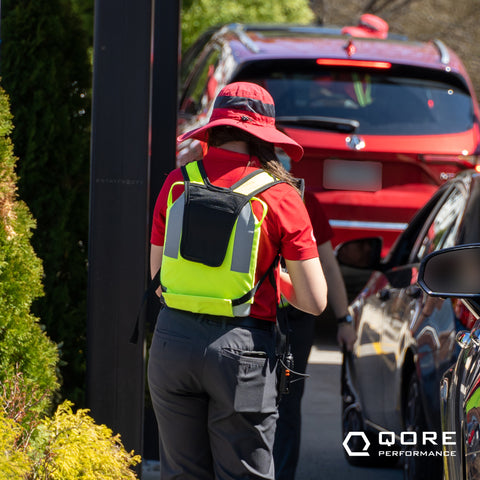 Chick-fil-A drive thru team members use IcePlate HiVis Backpack and IceCase iPad Cooling to maximize drive thru productivity