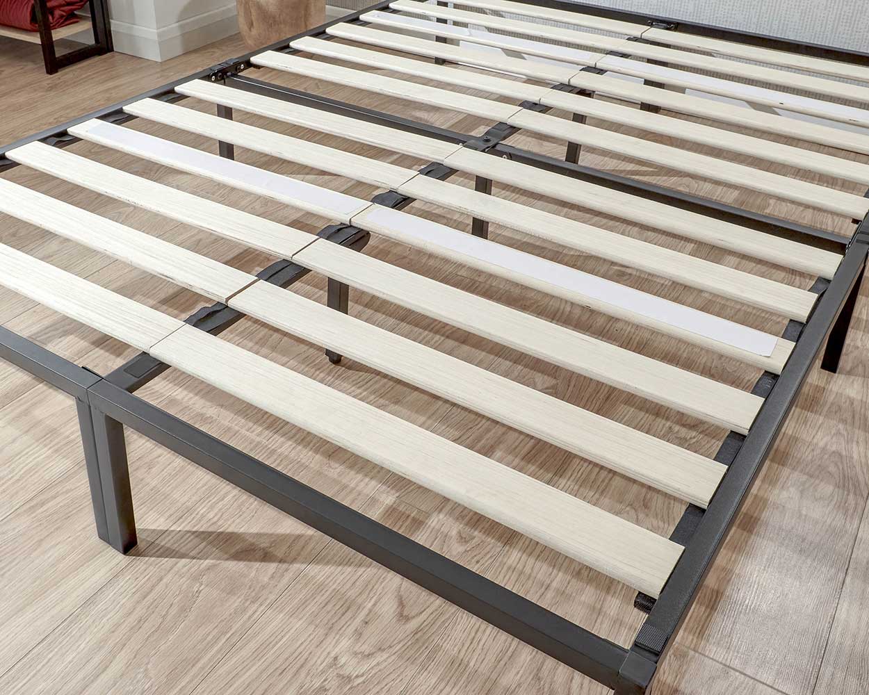 Black bed frame lifestyle base close up web 2 c85e1fdf 3fb8 4b7f bdfa c414598455ce