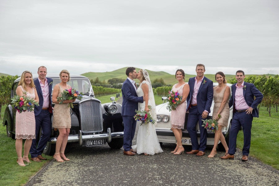 bridal party with vintage cars new zealand wedding