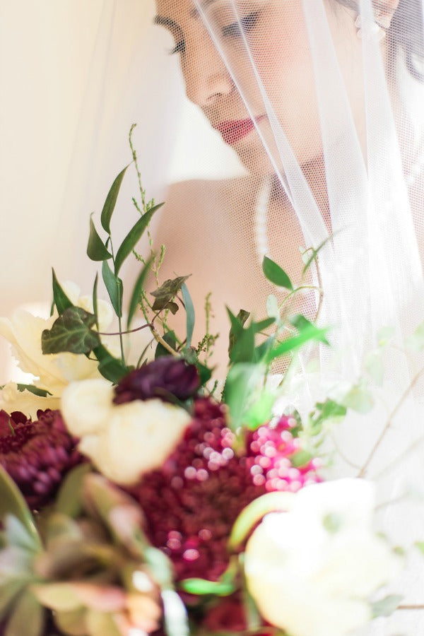 Elegant Latin Hacienda wedding red bouqet