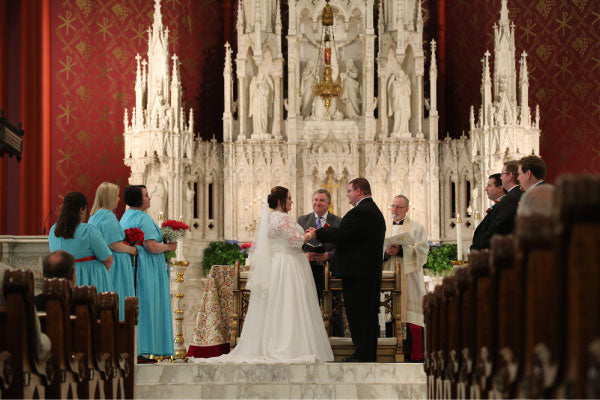 cathedral wedding in catholic church bride and groom