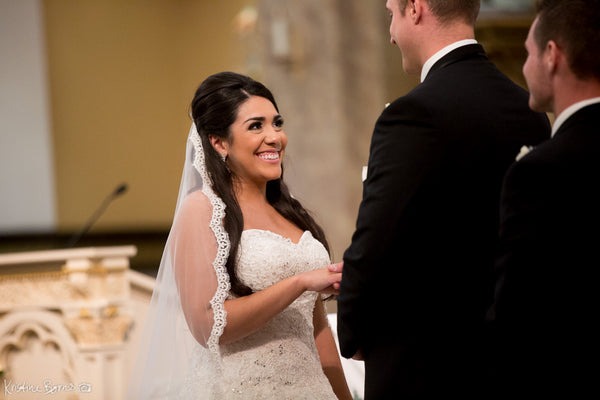 Bride in cathedral length mantilla veil from The Mantilla Company