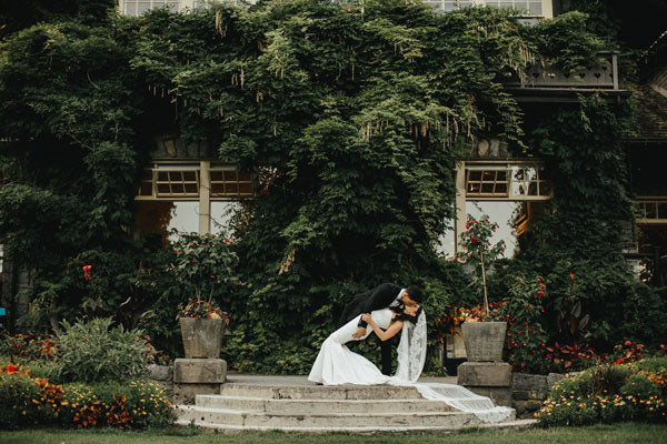 bride and groom portraits in the forest the kiss