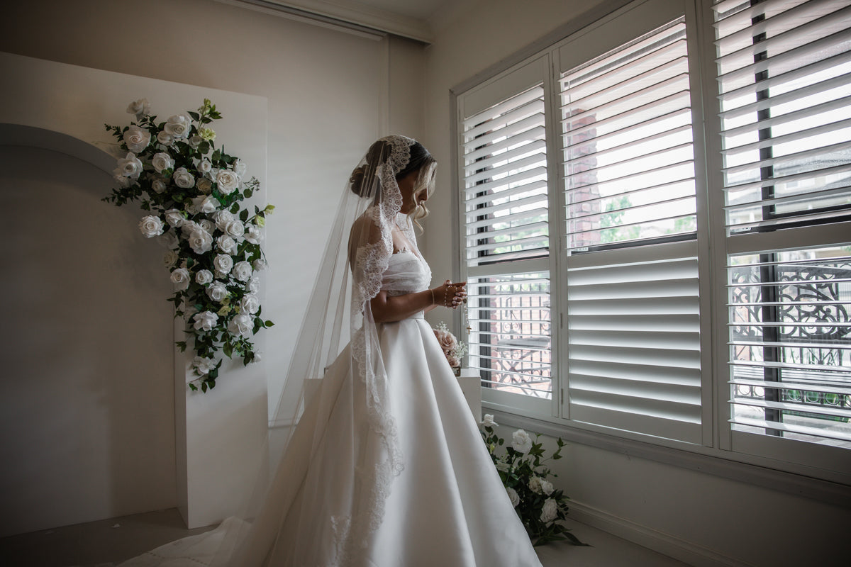 bride wearing mantilla veil