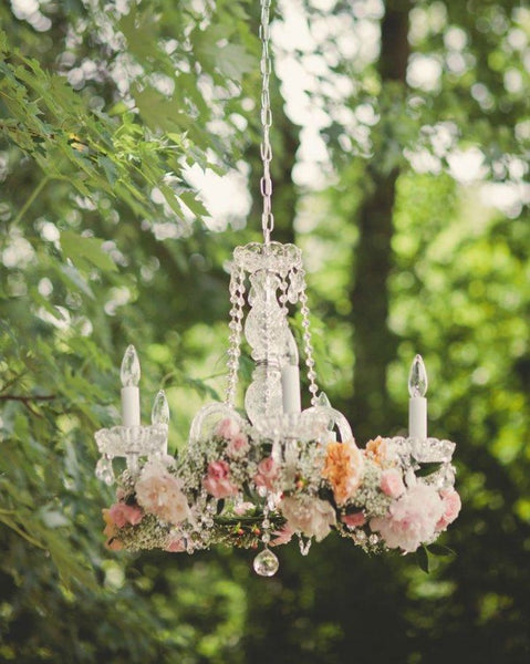 Vintage chandelier with flowers for wedding day