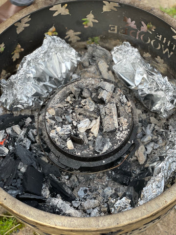 Cooking in a dutch oven in a Woodee fire pit