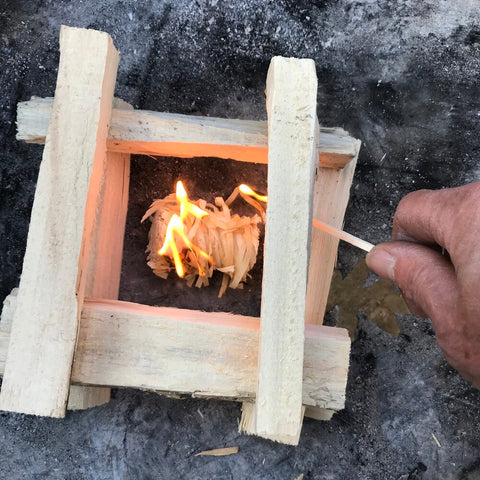 setting fire to wood