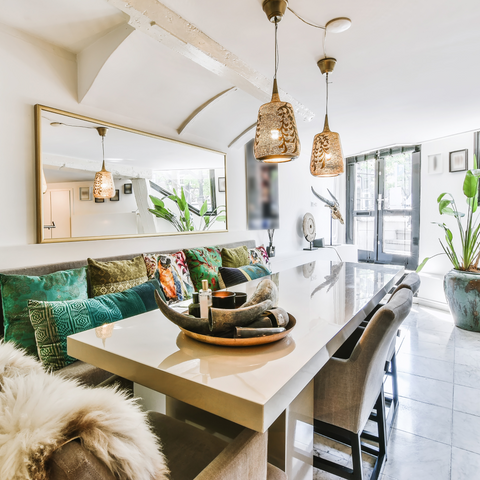 living room with unique light fixture pendants