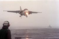An S-3A Viking aircraft descends through a heavy fog to land aboard the aircraft carrier USS FORRESTAL (CV-59) during the allied forces exercise Team Work '88.<br>- 1988