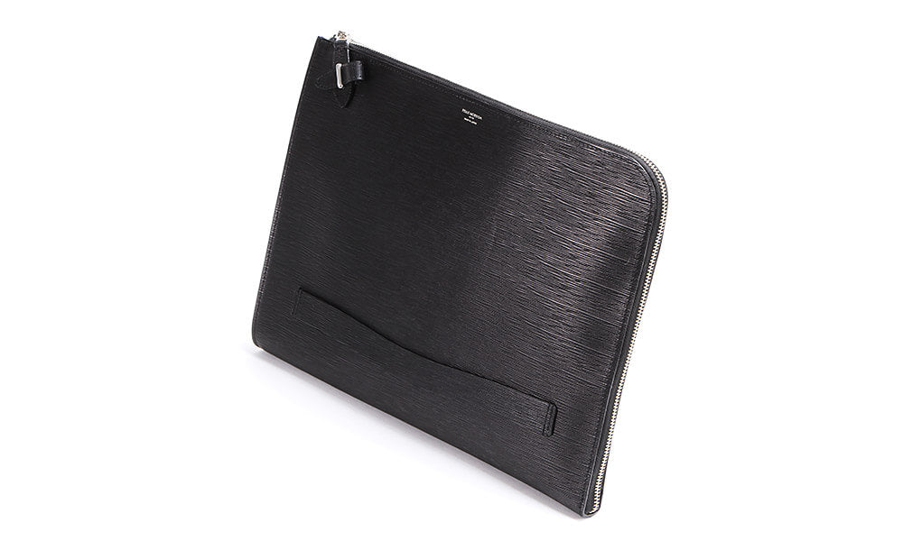 A clutch bag perfect for business that can hold all the necessary items.