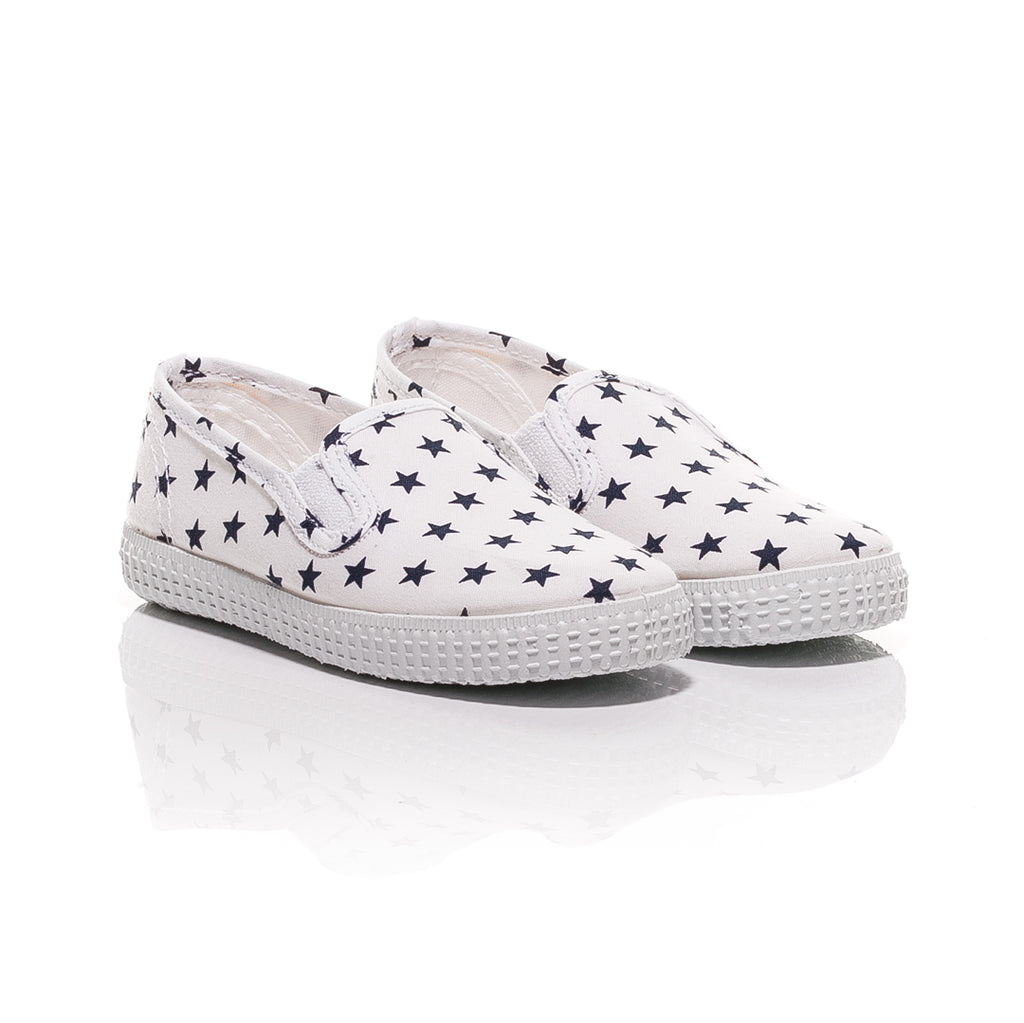 kids white canvas trainers