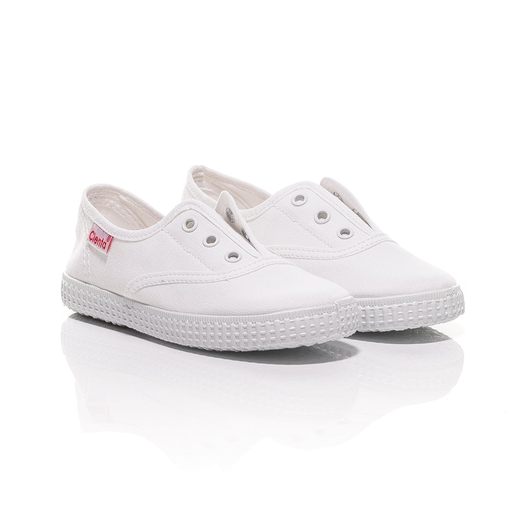 white slip on canvas sneakers