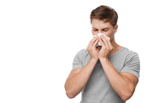 stock-photo-unhappy-millennial-european-attractive-man-blows-his-nose-in-napkin-and-suffers-from-runny-nose.jpeg__PID:0671dc53-6759-42c5-a312-684efc86e40e