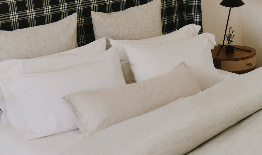 Bedding with throw pillows styled