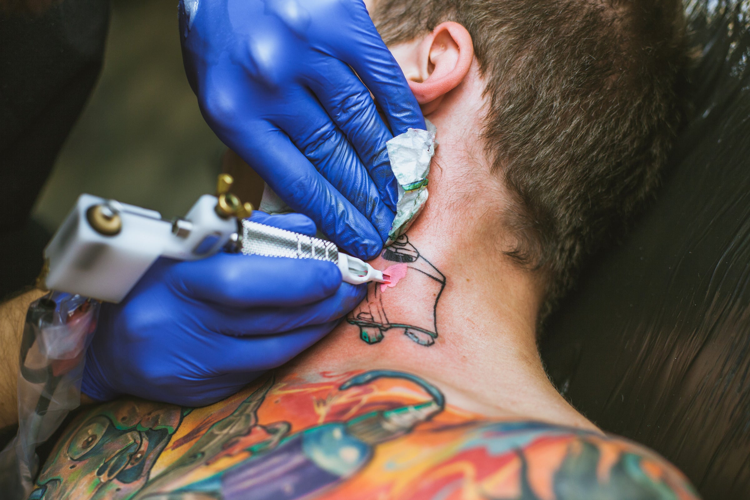 7 Factors to Consider When Tattooing Over a Cut