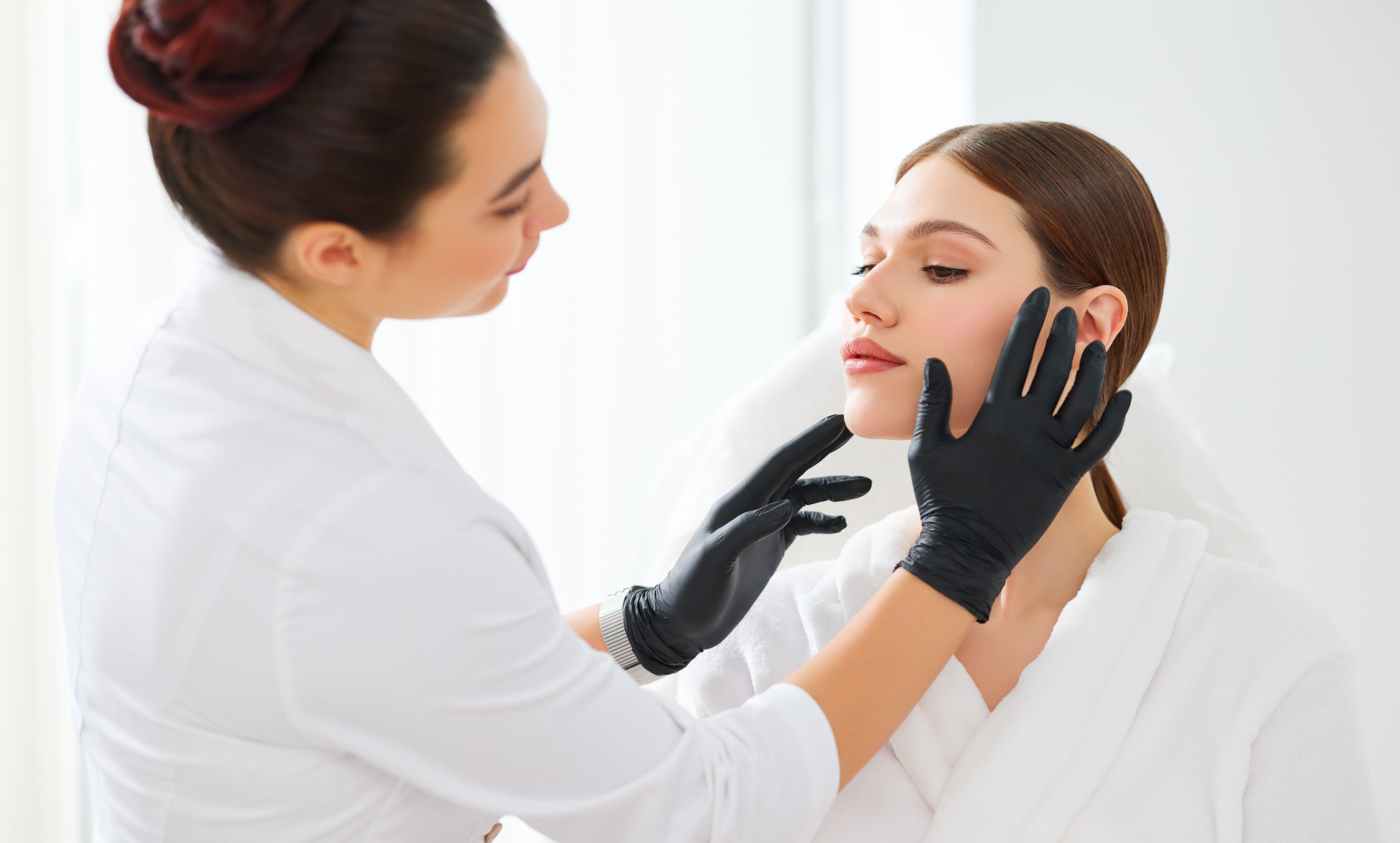 A consultation with a tattoo artist and a botox specialist