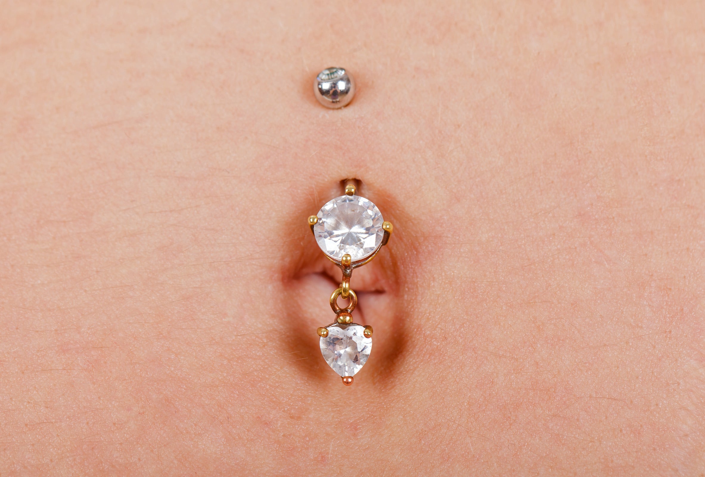 The 8 Best Ways To Treat An Infected Belly Button Piercing