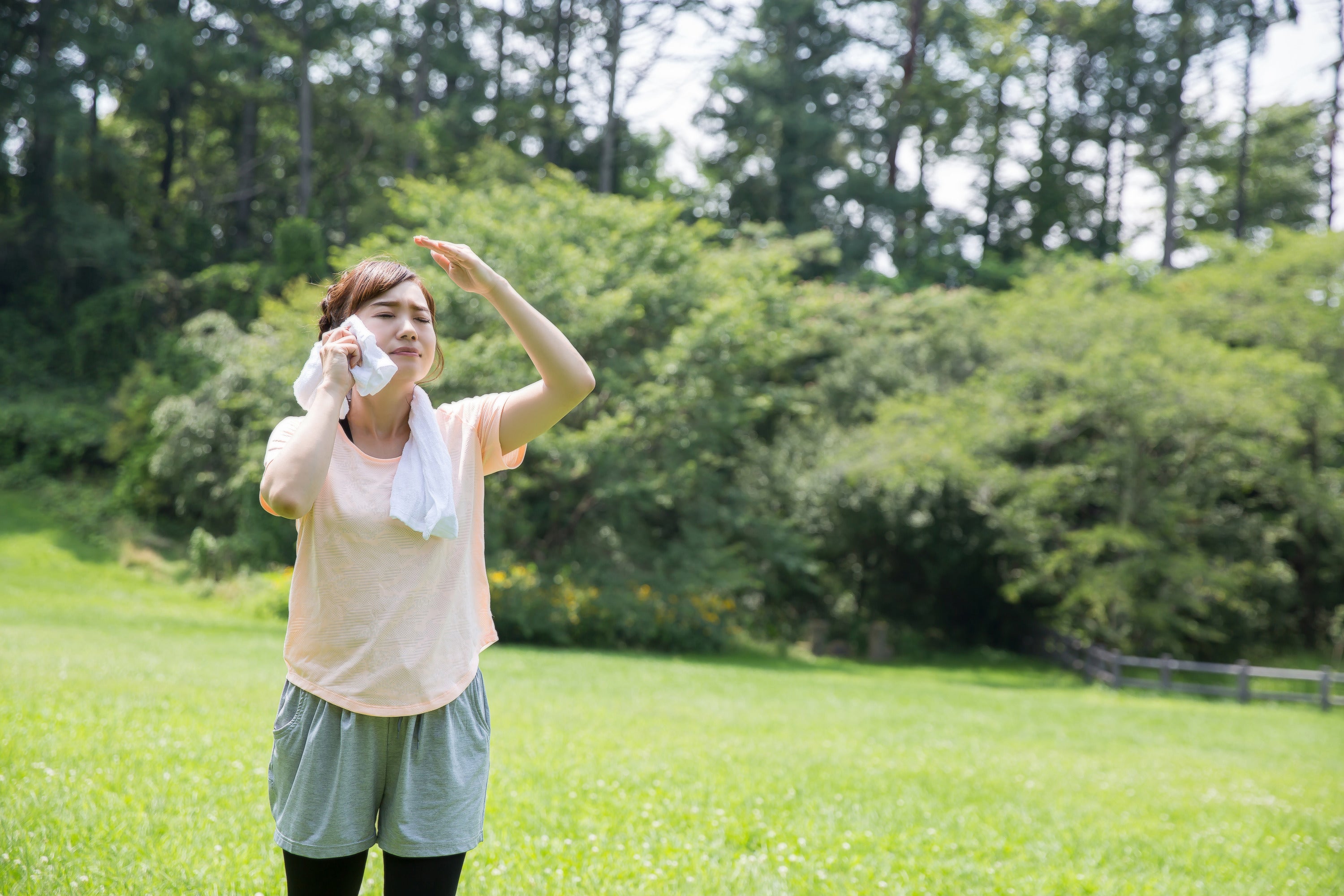 Limiting exposure to the sun by seeking shade