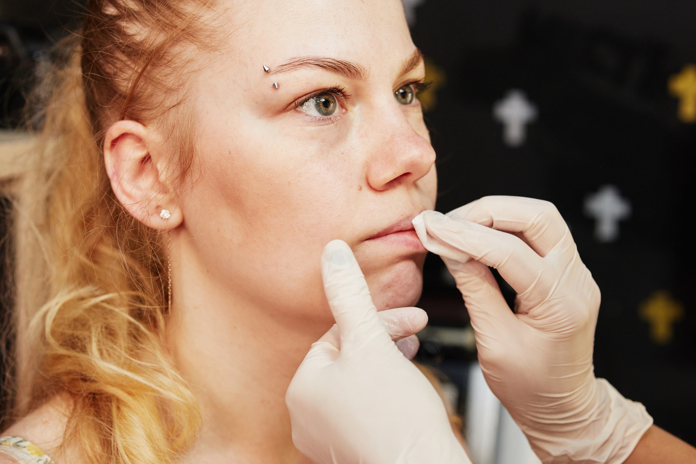 Disinfecting your lip piercing and taking care of it