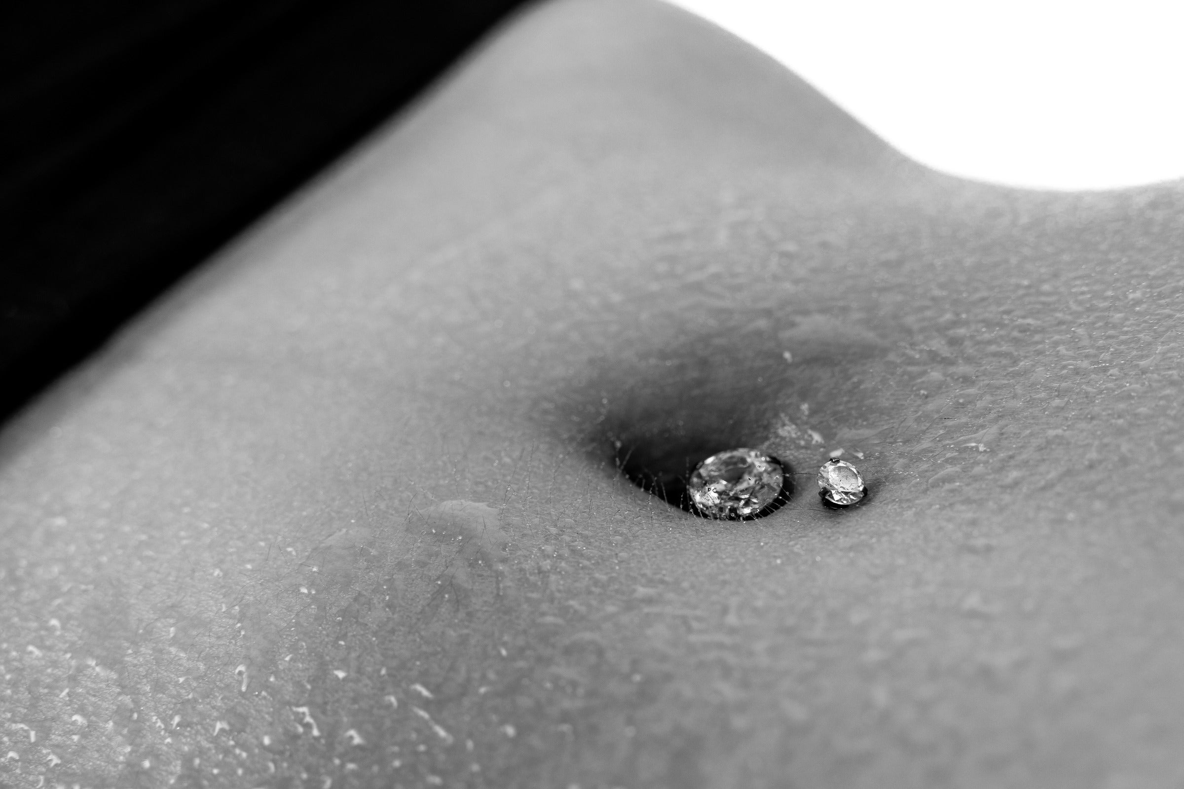 The 4 Possible Reasons My Belly Button Piercing Won't Unscrew