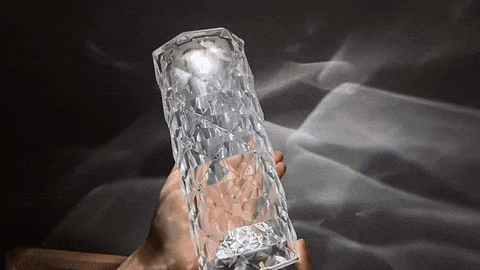 GIF of an acrylic crystal diamond lamp showing different colours
