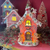 Picture of Viv! Christmas Kerstbeeld - Gingerbread Huis incl. LED Verlichting - roze wit - 20cm