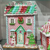 Picture of Viv! Christmas Kerstbeeld - Gingerbread Huis van Klei met Sneeuwpop en Snoepgoed incl. LED Verlichting - pastel roze - 36cm