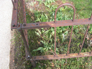 Photo showing Rusty Wrought Iron Fence