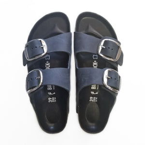 black birkenstocks with silver buckle