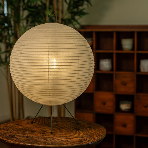 Mari Washi Paper Lamp illuminating a small room