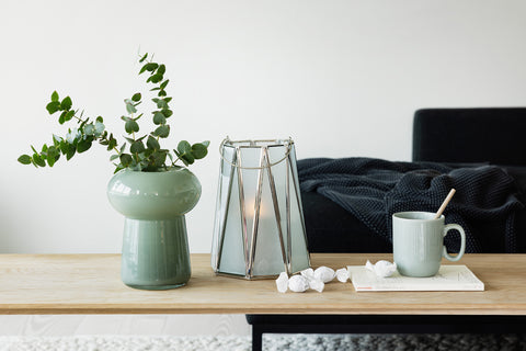 green vase, cup and glass lantern