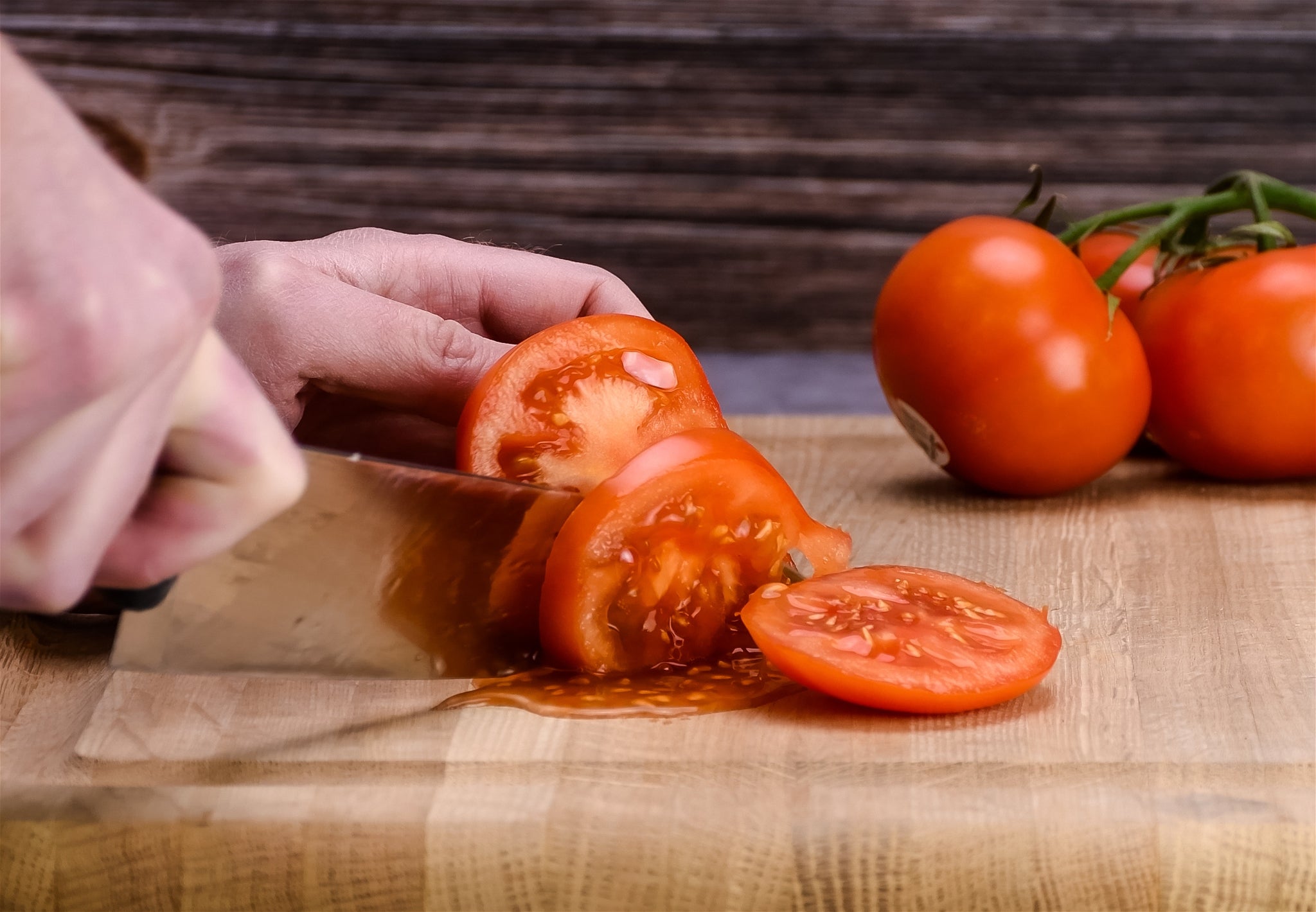 Dull Knife Crushing Tomato